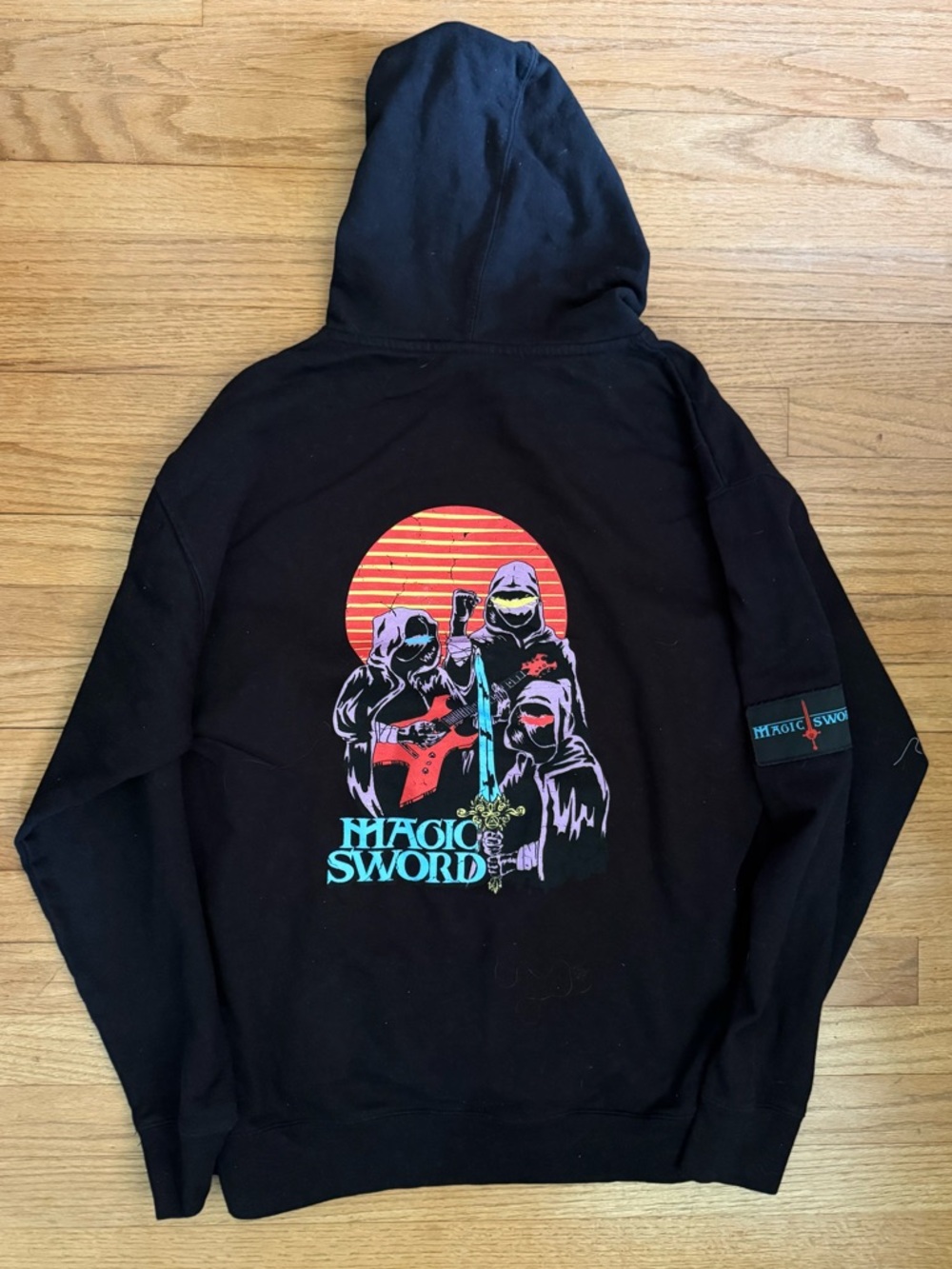 Magic Sword Black Graphic Hoodie with Neon Back Print